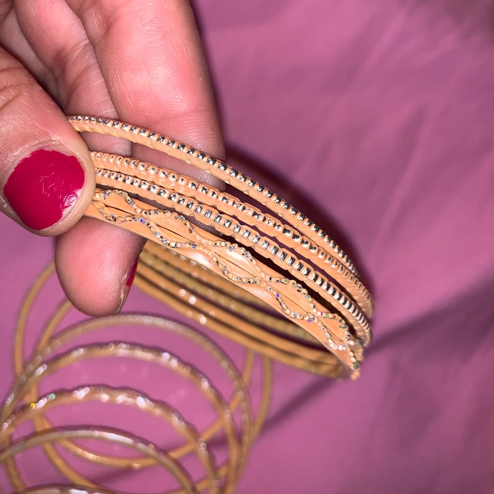 orange bangles with silver detail